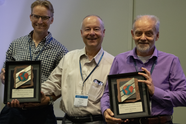 Julio and Peter receiving the 2023 CESM Distinguished Award